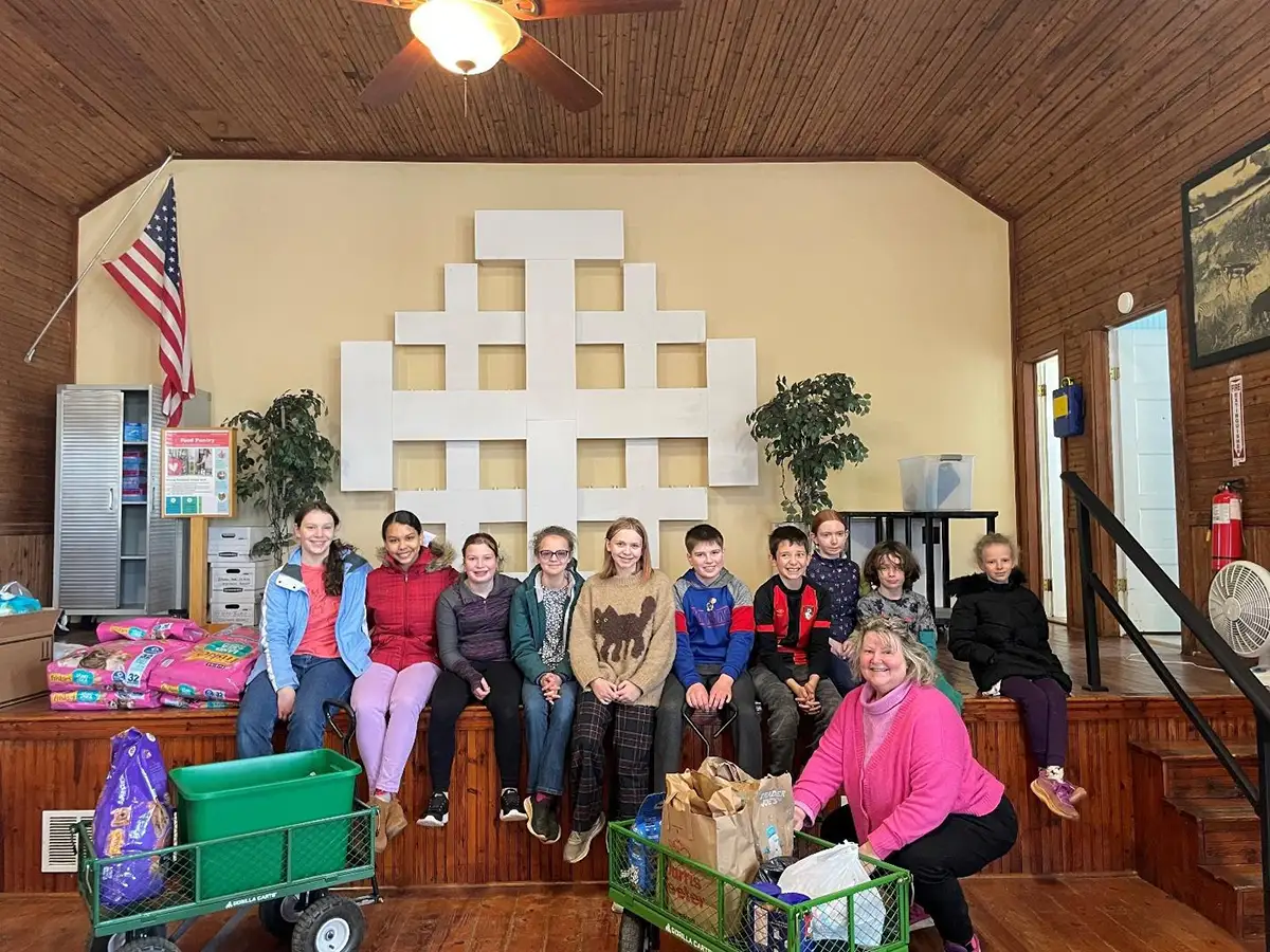 Members of the Rivanna Community 4-H Club in our Parish Hall, where we run our Food Pantry ministry